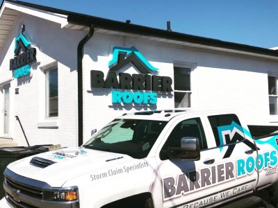 Barrier Roofs Headquarters in Lexington, KY with branded truck