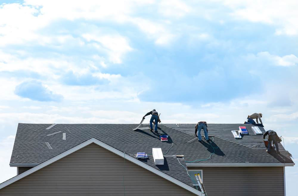 men doing roof work in lexington