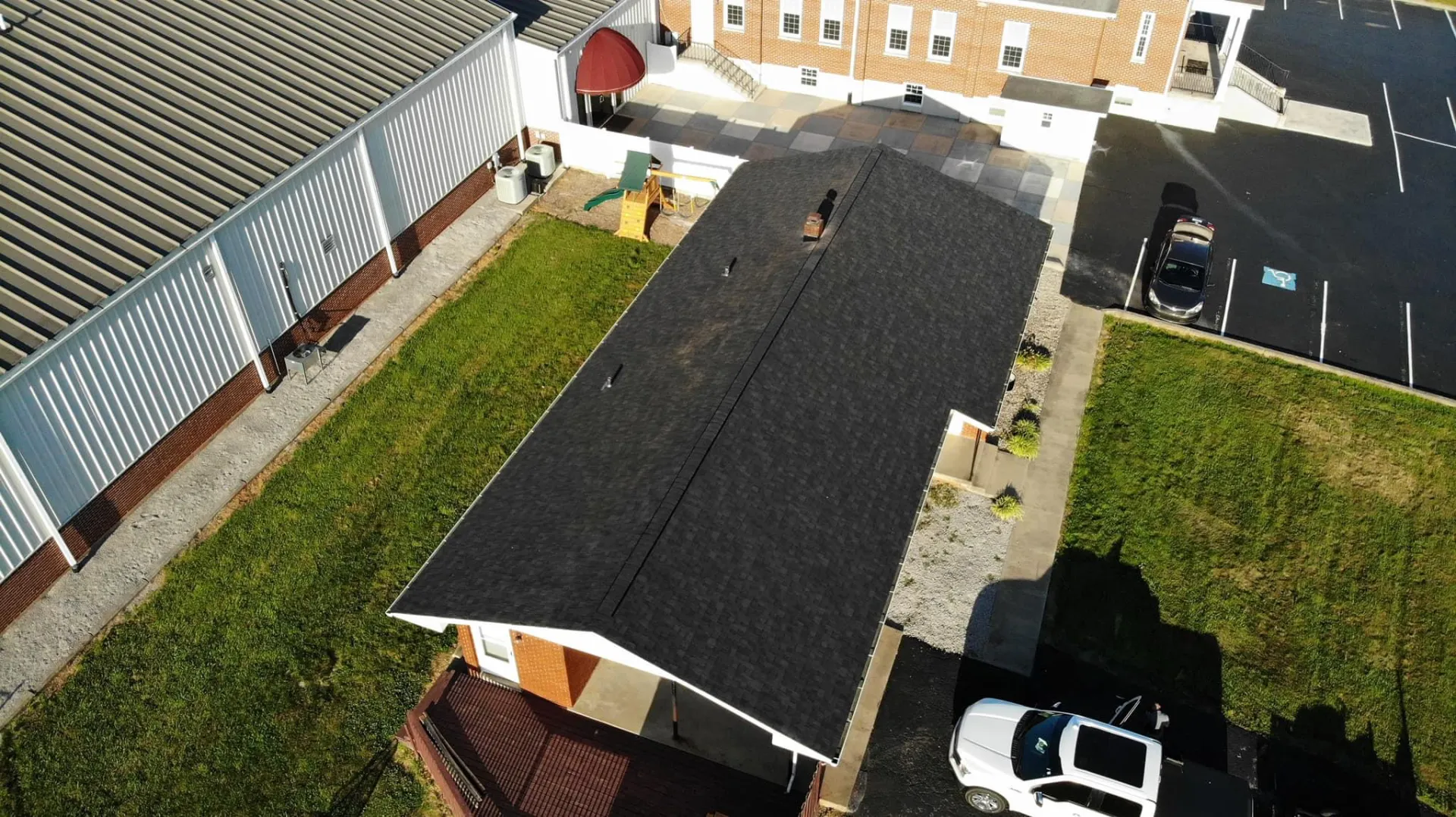 Aerial view showing Owens Cornin Onyx Black Roof Replacement at Bethel Baptist Church