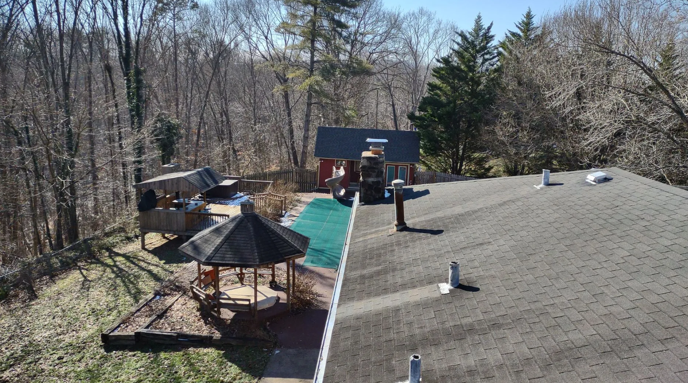 View of completed roof repairs on home in Williamsburg, KY