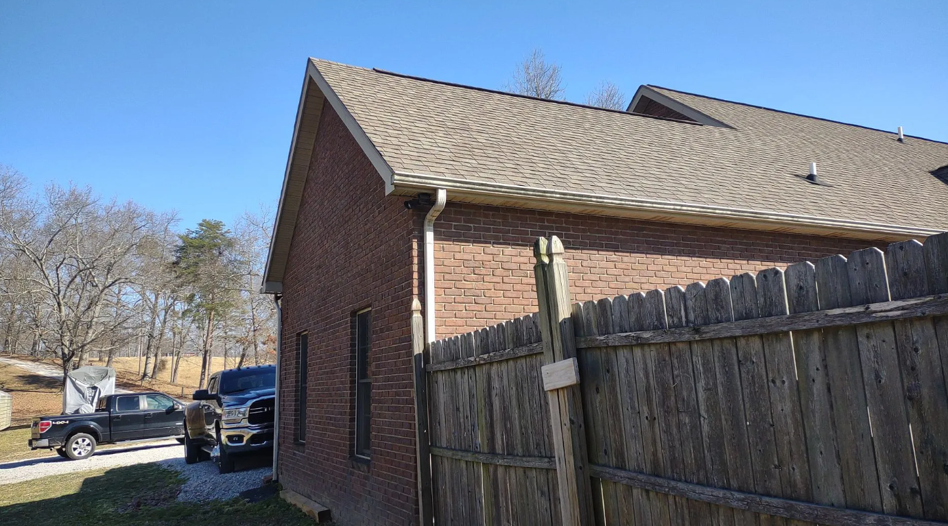 Backside view of new shingle installation on home in London, KY