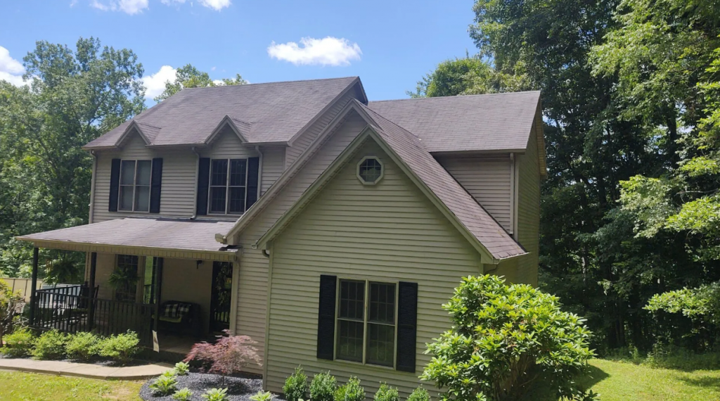 Residential home with siding and updated roof